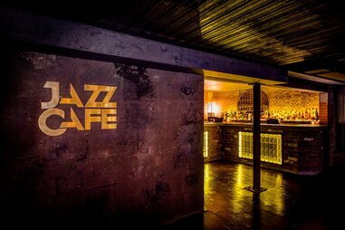 entryway to bar with “jazz cafe” signage