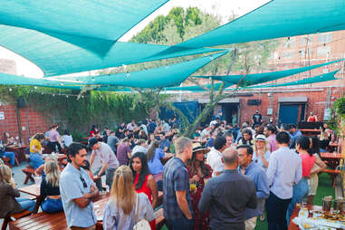 busy patio at everson royce bar in the arts district