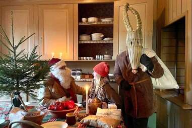 yule goat and santa at sweden's naas slott mansion