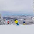 skiiers on a mountain