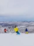 skiiers on a mountain