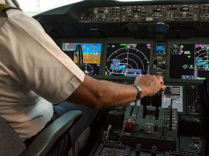 pilot in cockpit