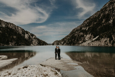 couple surrounded by mountains