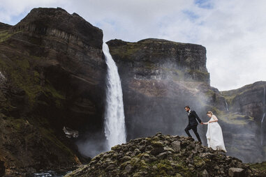 Couple by waterfall