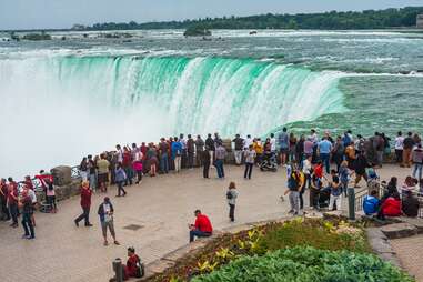 tourists observing niagara falls