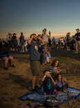 crowd watching eclipse 