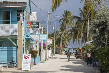 colorful beachside storefronts in caye caulker, belize