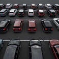 parking lot filled with rental cars