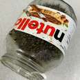 Rescuer Opens Recycling Bin And Finds Someone Stuck In A Nutella Jar