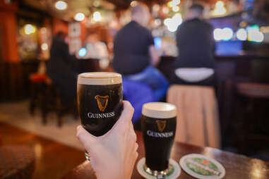 pints of guinness in a pub