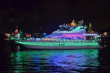 holiday boat, decorated for christmas, at the san diego bay parade of lights