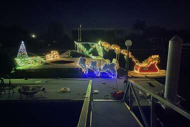 bribie island boat parade participant, decked out with lights and dolphins