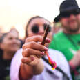 woman with joint at cannabis festival 