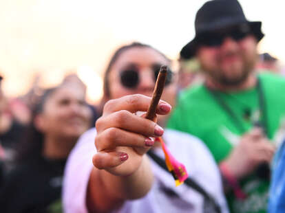 woman with joint at cannabis festival 