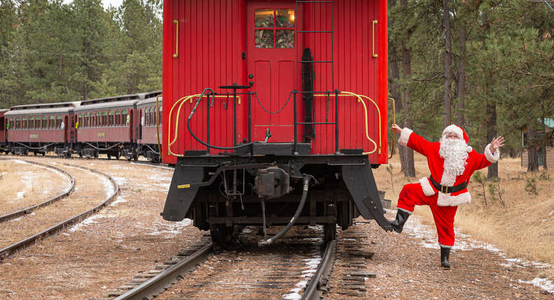 train coming around bend with santa