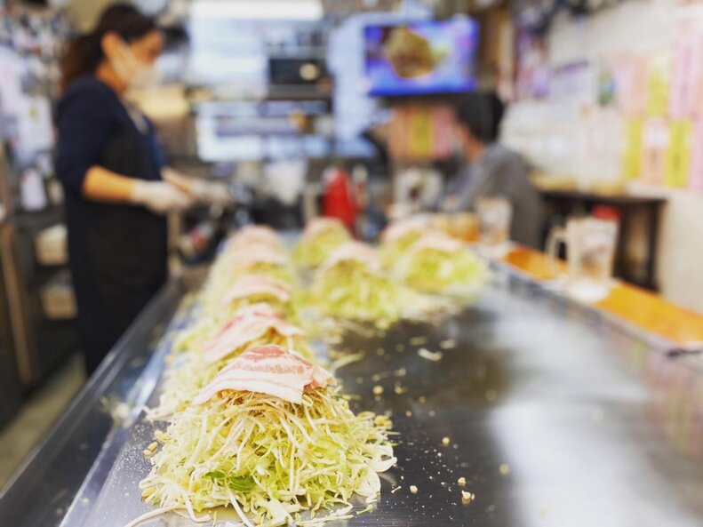 okonomiya on a grill at Ron Okonomiyaki, japan