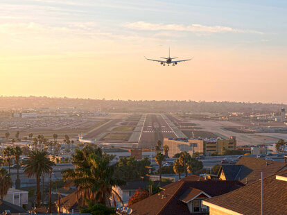 Passenger jet landing at San Diego’s Lindbergh Field. One of North Americas busiest airports Lindbergh Field is an international Airport