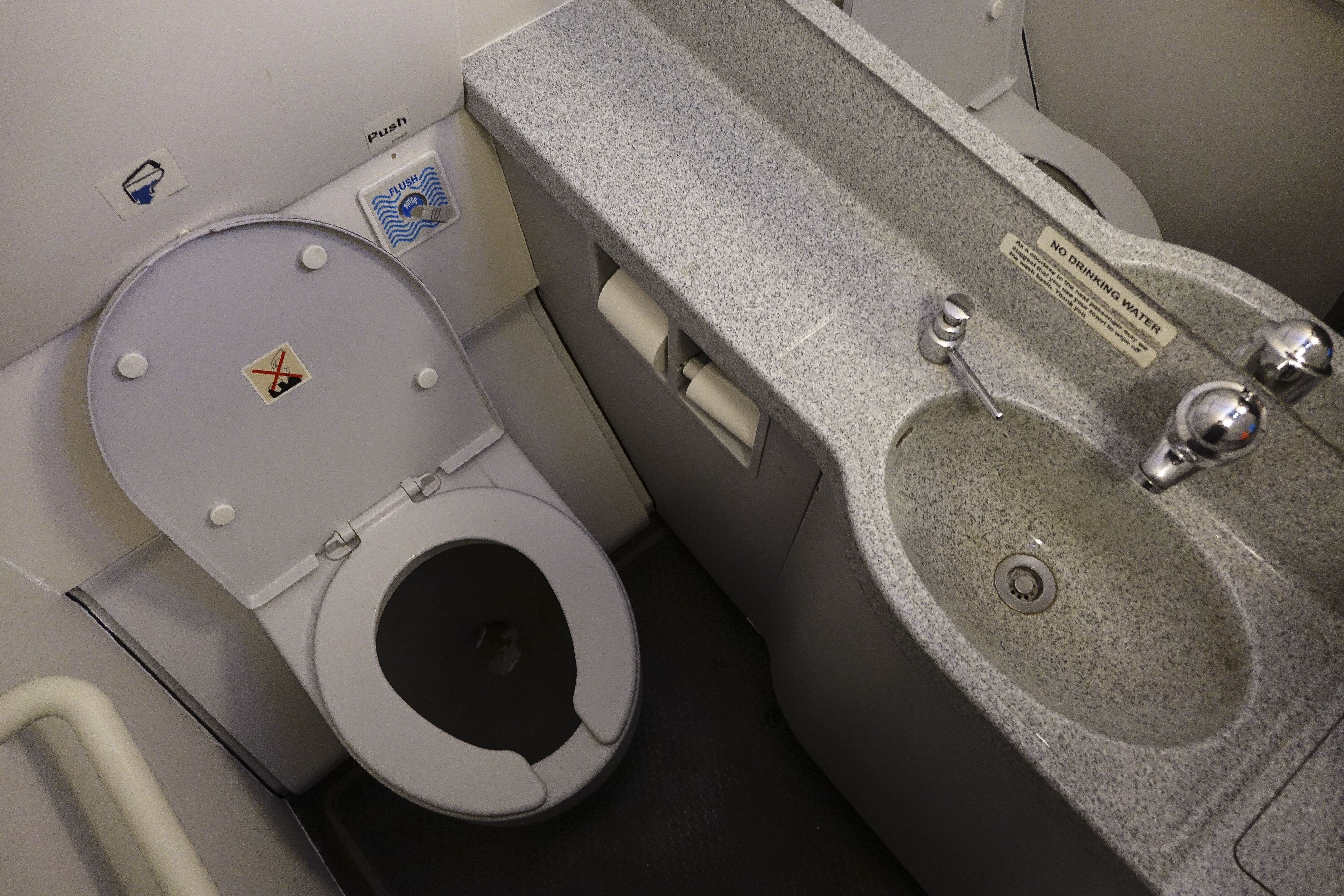 Someone Just Successfully Cooked Shrimp in an Airplane Bathroom Sink