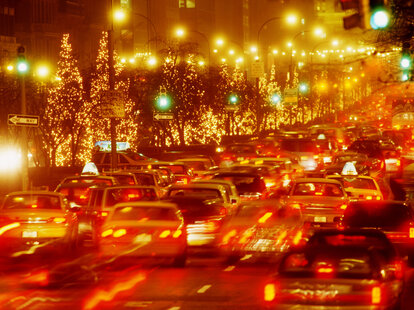 , New York City, Park Avenue, traffic at night during the holiday season.