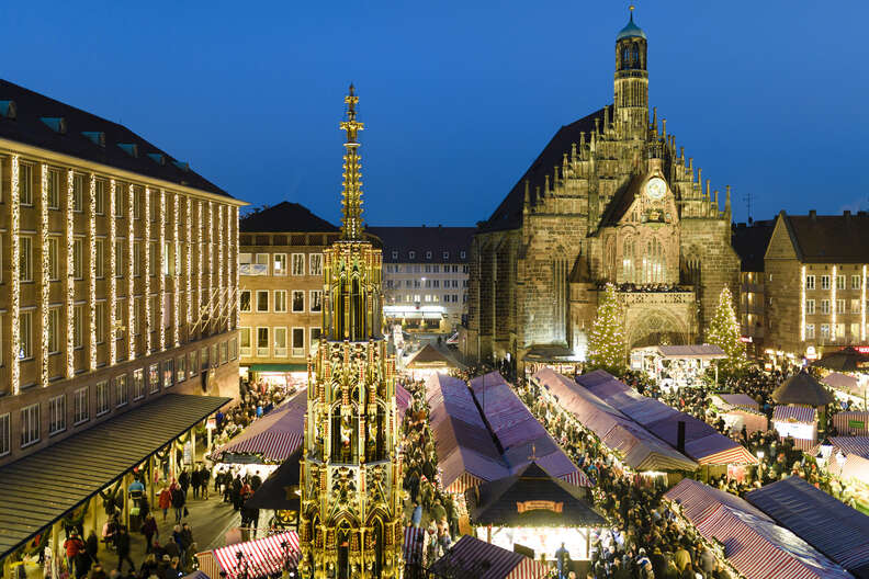 overhead view of germany christmas market, lit at night