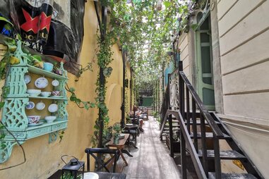 tables and chairs at a restaurant la victoriana in a victorian-style home in guanajuato, mexico