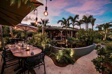 outdoor dining setup at the restaurant tamarin in st barts