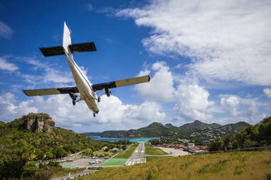 airplane landing at the notoriously short runway in st. barts