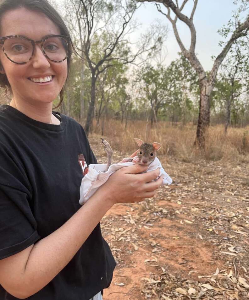 woman holding wallaby