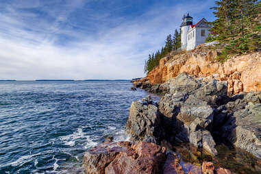 coastal view of lighthouse on mount desert island, maine