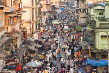 the central bazaar of mumbai india full of pedestrians