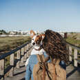 Woman with dog in Portugal