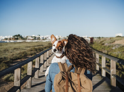 Woman with dog in Portugal