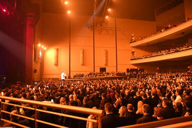 performer and large crowd in theater in las vegas