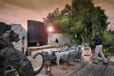 Outdoor dining space at Cheetah Plains Lodge, in South Africa’s Sabi Sands.