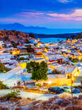 Lindos small whitewashed village and the Acropolis, scenery of Rhodos Island at Aegean Sea.