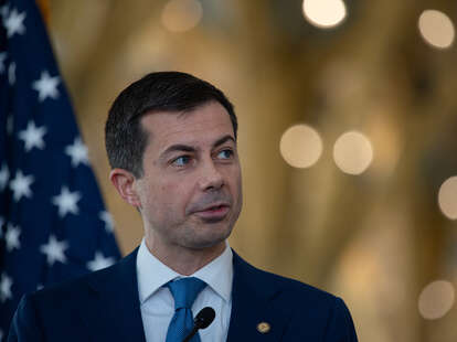 Pete Buttigieg, US transportation secretary, speaks during a news conference at Ronald Reagan National Airport in December 2023