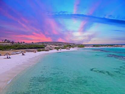 Aerial view from Baby Beach on Aruba in the Caribbean Sea at sunset.