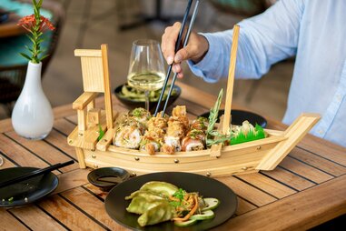 sushi boat at bobbies beach club in statia