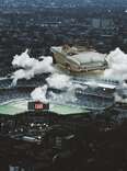 illustration of a vintage car floating above wrigley field in chicago