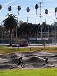 bikers and skaters at the inglewood pump track