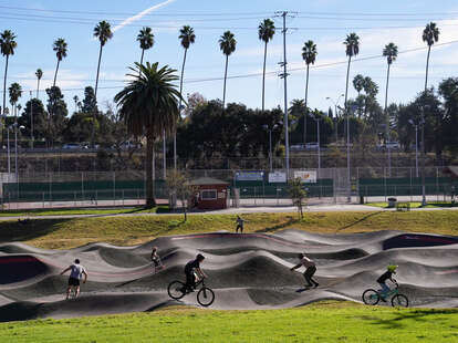 bikers and skaters at the inglewood pump track