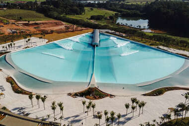a pie-shaped pool with surf waves