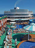 The pool deck of the cruise ship Norwegian Gem is busy as passengers enjoy their first day at sea on their cruise to Bermuda.