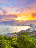 The building and skyscrapers in twilight time in Pattaya,Thailand. Pattaya city is famous about sea sport and night life entertainment.