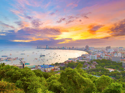 The building and skyscrapers in twilight time in Pattaya,Thailand. Pattaya city is famous about sea sport and night life entertainment.