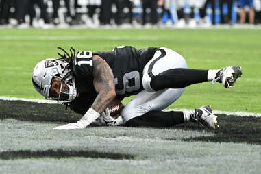 LAS VEGAS, NEVADA - JANUARY 07: Wide receiver Jakobi Meyers #16 of the Las Vegas Raiders scores a first-quarter touchdown