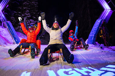 People on Light Ride Mario Kart sled track in Switzerland