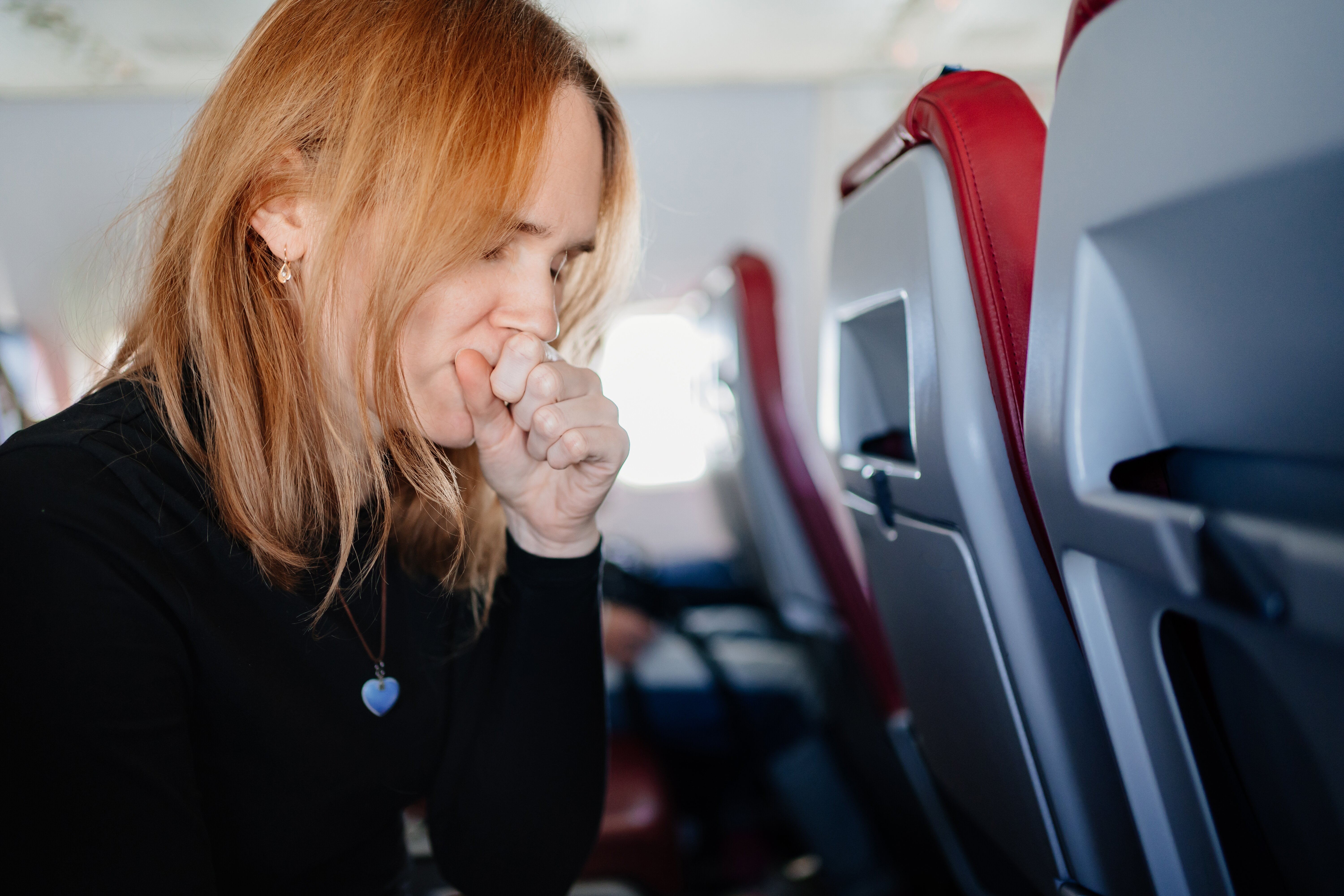 Coughing on a Plane Without a Mask Is Just Asking for Trouble