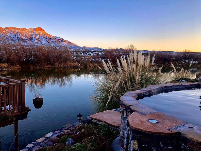 hot spring surrounded by mountains at Riverbend Hot Springs, new mexico