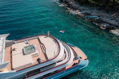 guests on the deck of the ohana superyacht